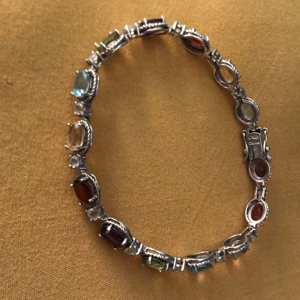 7 1/2” 925 silver multi-colored stone bracelet.